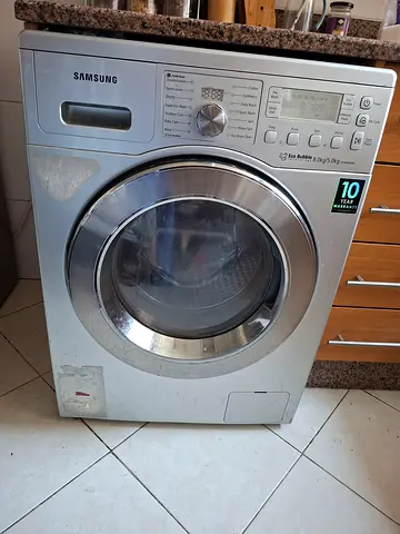 Samsung washing machine for sale. The machine is not working and trips the breaker immediately