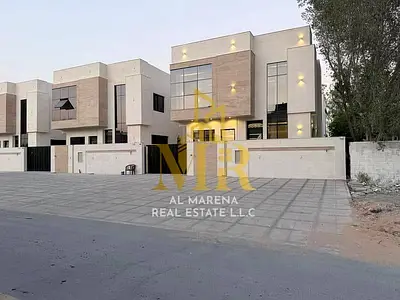 Luxury villa for sale in Al Bahia, Ajman. Registration and ownership fees, electricity and water co