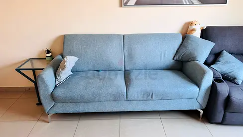 Light blue 3-seater fabric sofa in good condition