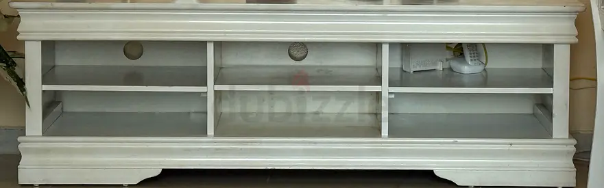 White wooden TV stand and entertainment unit