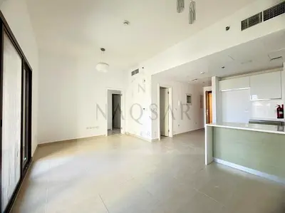 شقة بغرفة نوم واحدة | برج الأندلس F | شرفة تطل على المجتمع | تصميم غير مفروش