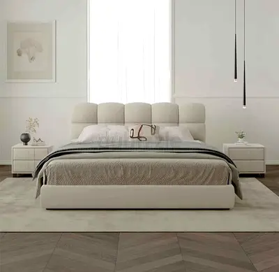 Modern upholstered queen bed with padded headboard in beige