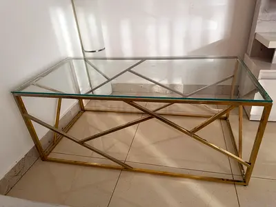Glass Top Gold Metal Coffee Table with Geometric Frame