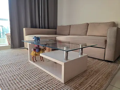 Glass Top Coffee Table with White Base - Modern Design