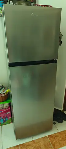 Silver top-freezer refrigerator - good working condition