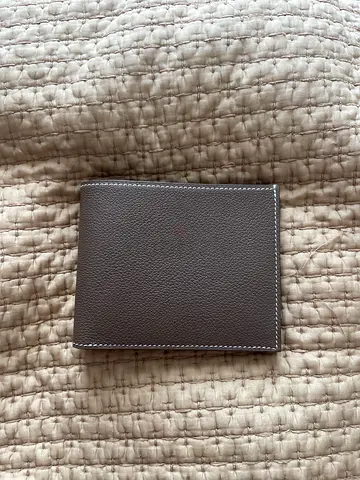 Grey leather bi-fold wallet, gently used