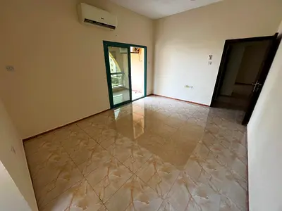 The most beautiful and spacious apartments for annual rent. Two-bedroom apartment with a living room, second row on Ajman Corniche. 34,000 AED payable