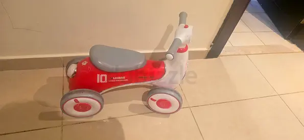 Little red and white ride-on toddler car - good condition
