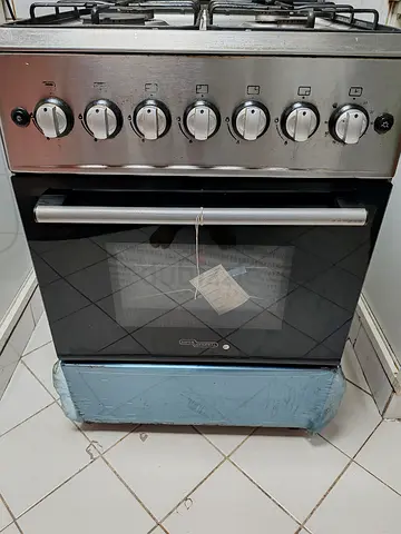 Used 4-Burner Gas Stove with Oven - Stainless Finish
