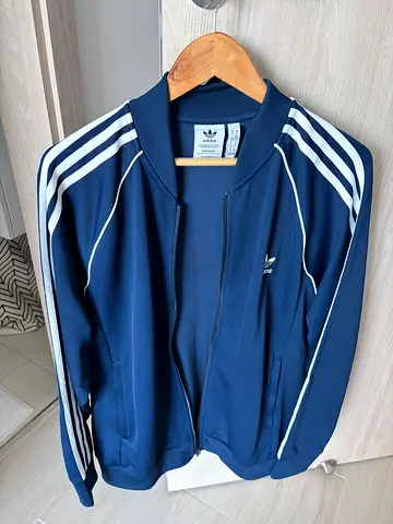 Adidas navy blue track jacket with white stripes - size L