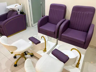 Used salon pedicure chairs set with white footbaths and stools - purple