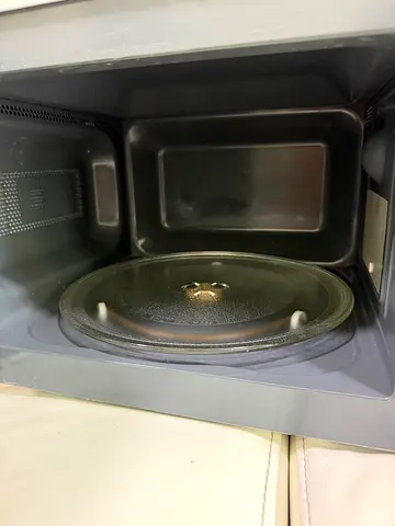 Used microwave oven - working, with glass turntable