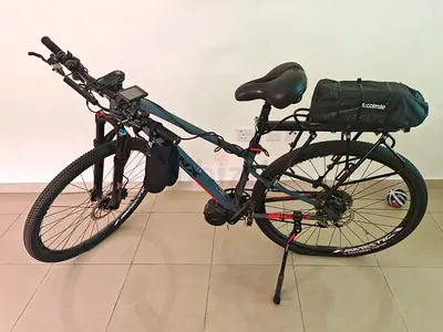 Trinx Electric Hybrid Mountain Bike with Rear Rack Bag - Good Condition