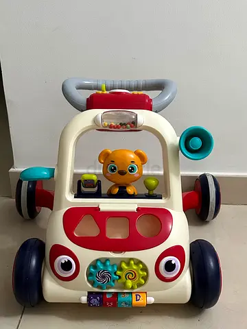 Baby push walker activity car with lights and toys - good condition