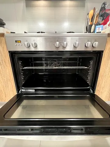 Stainless steel built-in electric oven and gas stove in good condition
