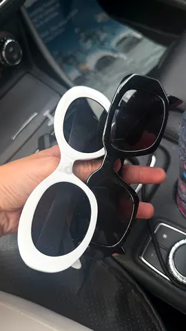Pair of stylish black and white sunglasses - used, good condition