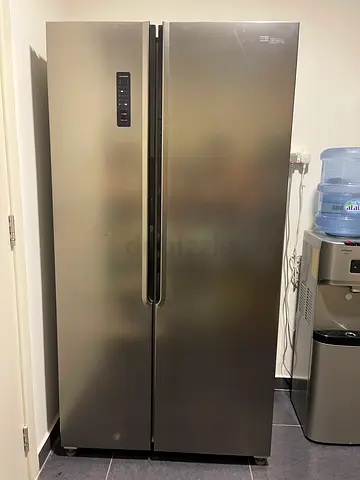 Large side-by-side stainless steel refrigerator -Very good condition