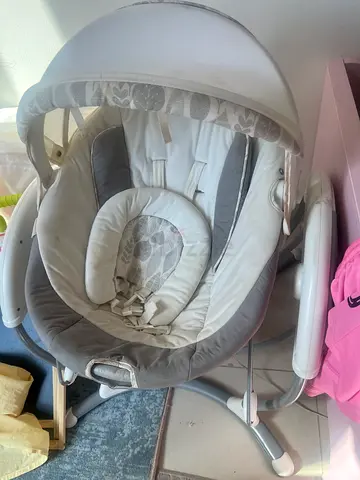 Gently used baby swing/rocker with canopy and harness - neutral grey
