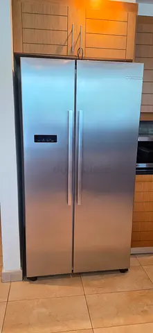 Large stainless steel side-by-side fridge/freezer Bosch brand - Perfect condition
