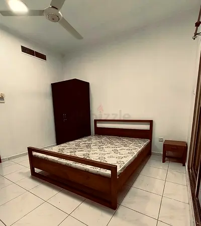 Private room with a balcony for a working couple or family, near Ansar Gallery/ Burjuman ex-2
