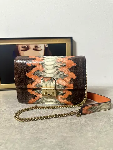 Dior Phyton embossed crossbody bag with charm