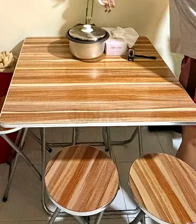 Compact folding dining table with 4 matching stools - wood finish