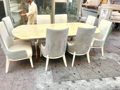 Solid wood oval dining table with 8 upholstered chairs - light cream set