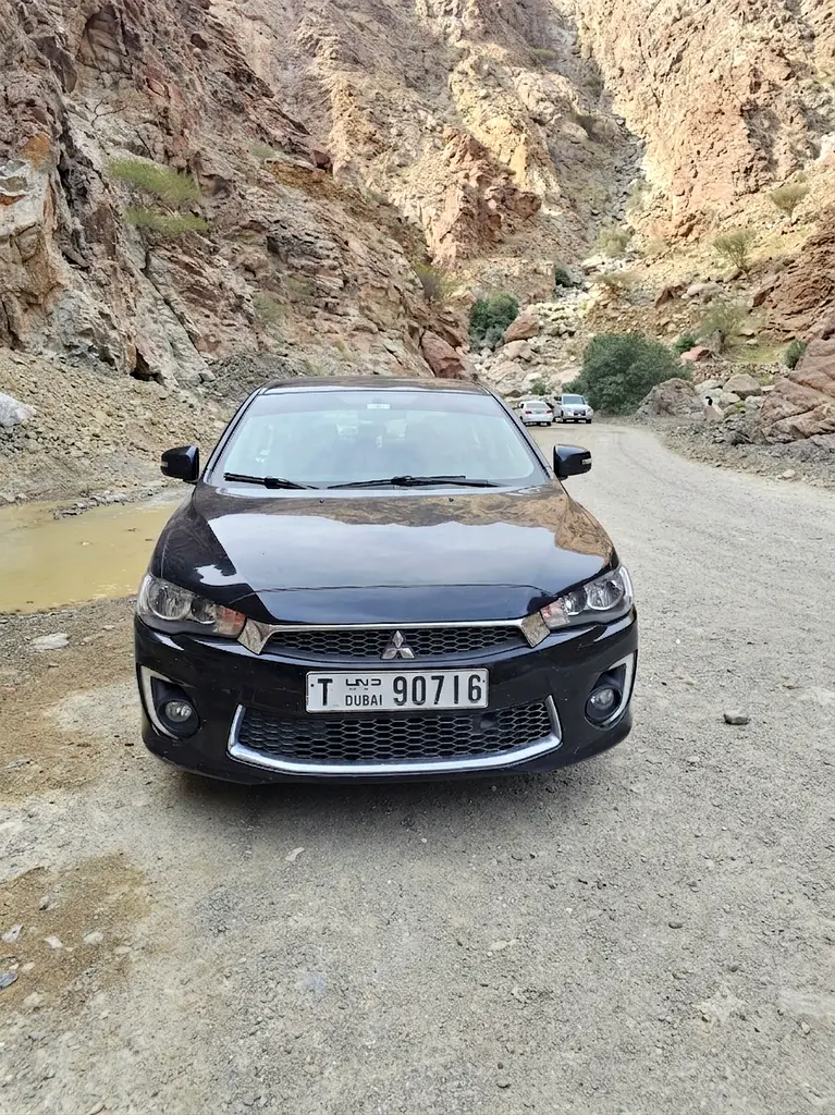 Mitsubishi Lancer 2016 — photo 1 of 2