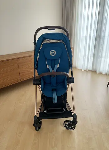 Cybex Mios Stroller with Rose Gold Frame and Blue Seat