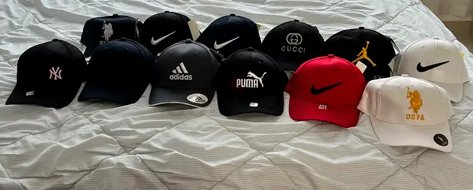 Lot of 13 branded baseball caps (Nike, Adidas, Puma, Gucci, Jordan, NY  more)