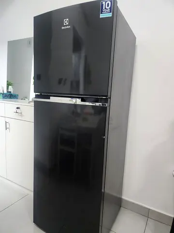 Compact top-freezer refrigerator in good working condition