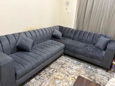 L-shaped grey velvet sectional sofa - good condition