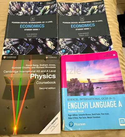 Set of A-Level GCSE Textbooks: Economics (x2), Physics, English Language A