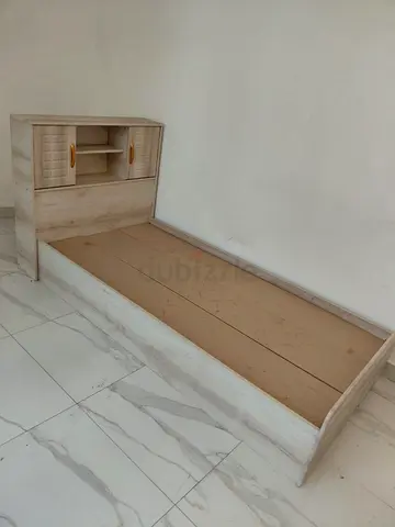 Single bed frame with headboard storage