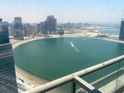 Luxury 3-bedroom apartment with a spacious living room and 4 bathrooms for annual rent in Al Khan,