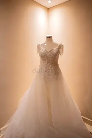 Elegant white lace wedding gown with tulle skirt - size available upon request
