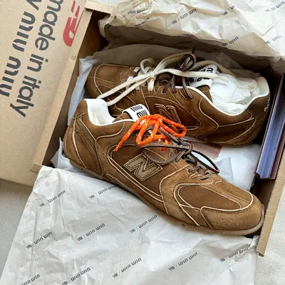 Miumiu Brown suede New Balance sneakers - size not specified, lightly used