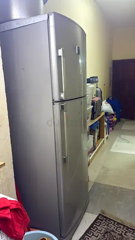 Good condition double-door refrigerator - spacious, silver finish
