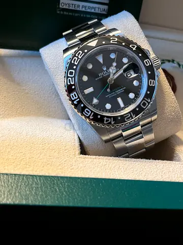 Rolex 116710 GMT Green Arrow , 2011 , box, outer box and papers/ guarantee card dated 2011.