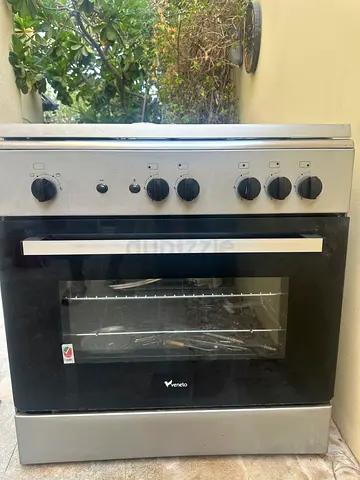 Used gas cooker with electric oven and grille 90x60 cms in stainless steel good working condition
