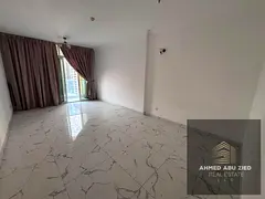 An exquisite 2-bedroom apartment with a living room available for annual rent in Al Waha Towers, Al