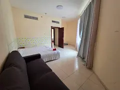 semi-furnished private room. Available in Alnahda 2 opposite pond park . Close to bus station