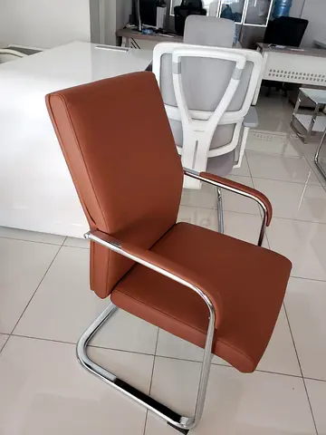 Brown leather visitor office chair with chrome frame