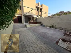 Elegant Two Storey Villa with a Spacious Garden Just Steps from Al Heera Beach