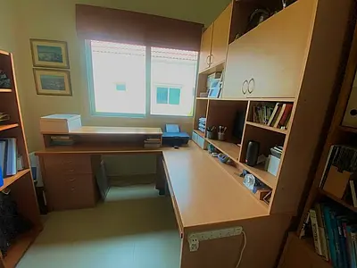 Office desk and bookcase.
