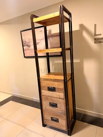 Industrial-style tall shelving unit with 3 drawers