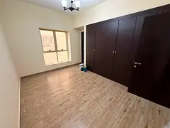Two bedrooms and a living room for annual rent in Sharjah, New Muwaileh area | Free parking | Built-