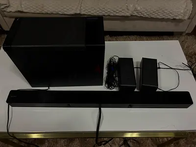 Sony HT-RT3 5.1 Channel Home Theater Systemincluding soundbar, the subwoofer and the two rearspeaker