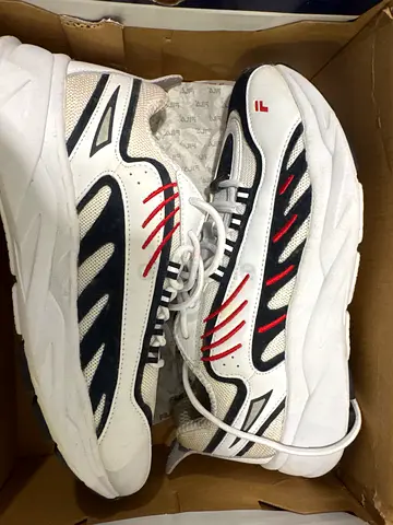 White athletic sneakers with navy  red accents — size unknown, lightly used 43 size