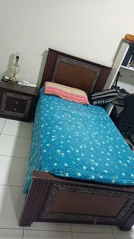 Single wooden bed with matching nightstand - good condition